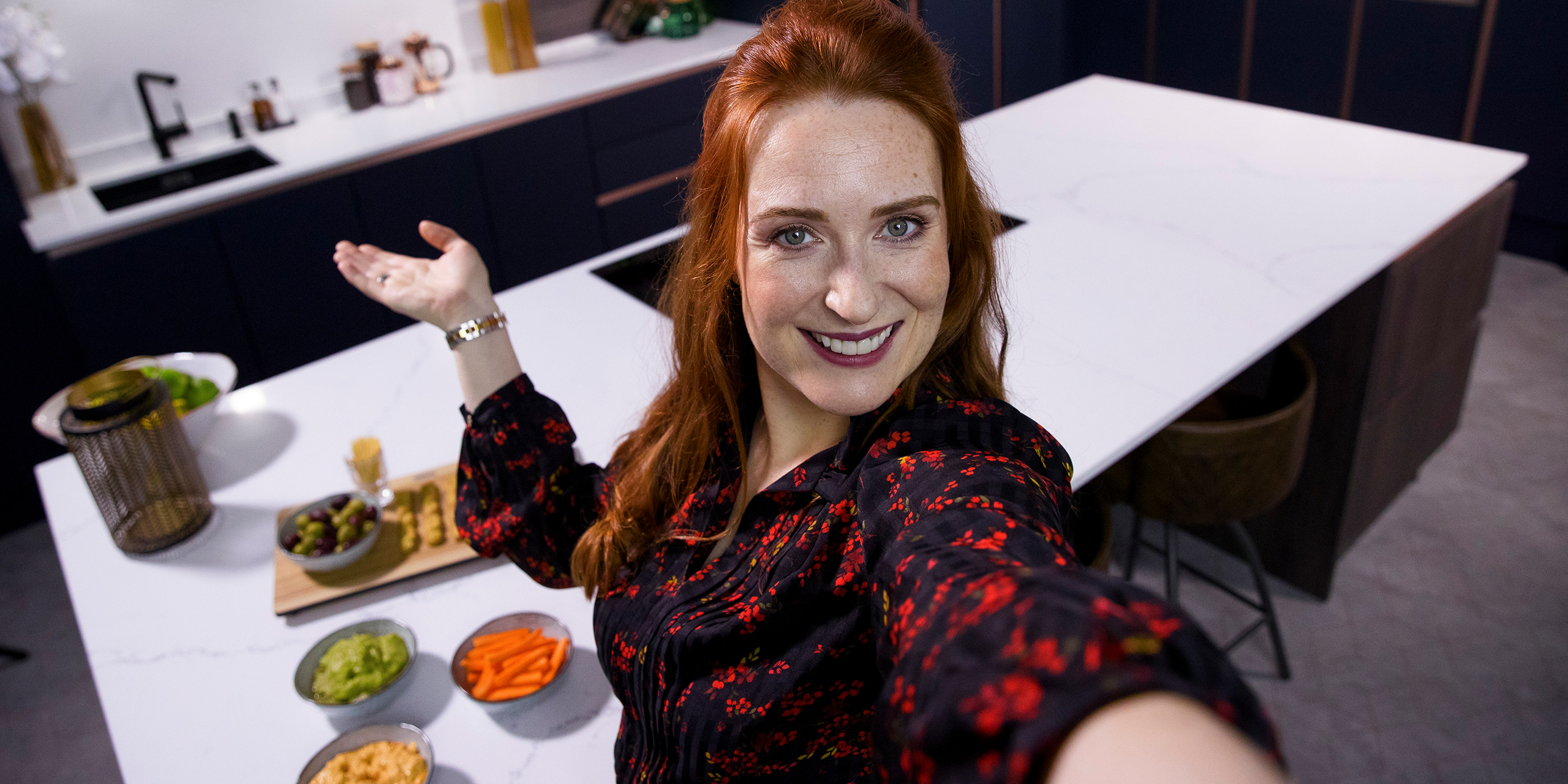 Woman taking selfie in her Kitchen from the Kitchen Depot