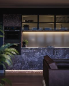 Marble effect kitchen door in a masculine open plan kitchen dining room space using The Kitchen Depot's Marquina Marble from the Linea range.